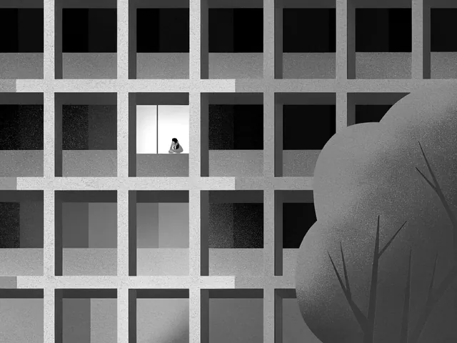 A building facade as a grid of dark windows, one lit with a figure at a desk